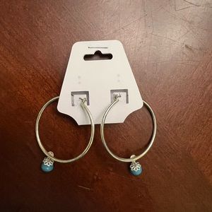 Hoop earrings with beautiful blue bead…..great for any occasion